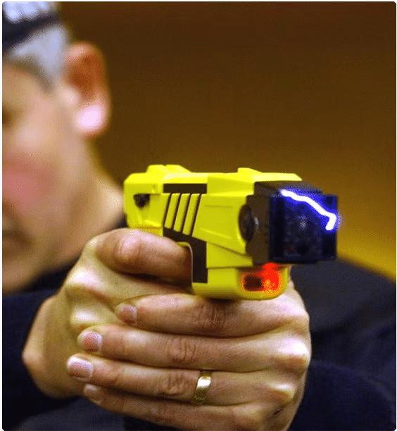 An image of a person hold in hand yellow color Stun Guns for Self-Defense product