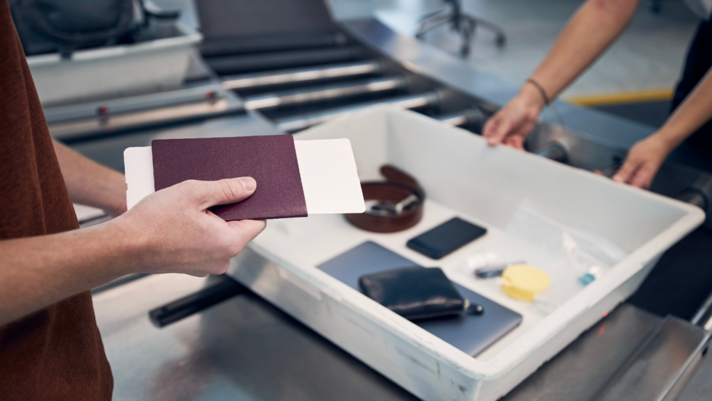 An Image of Airport Security Personal Belongings Search