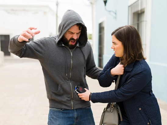 A women defends herself and attacks a man with a Stun Guns