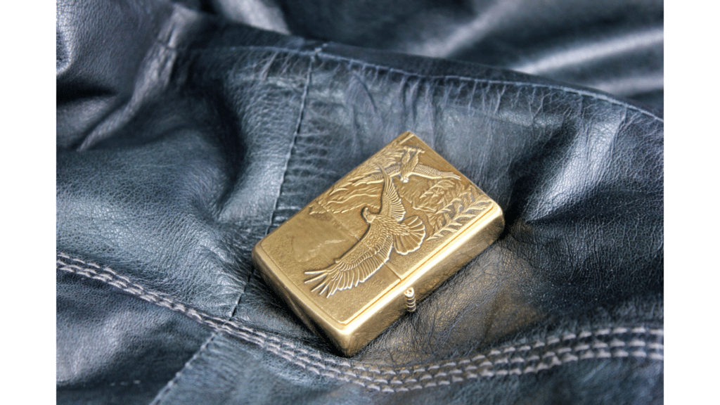 gold color designed aesthetic gold lighter on a denim