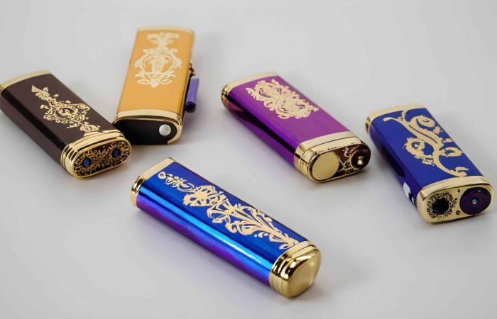 5 fancy lighters on a white surface